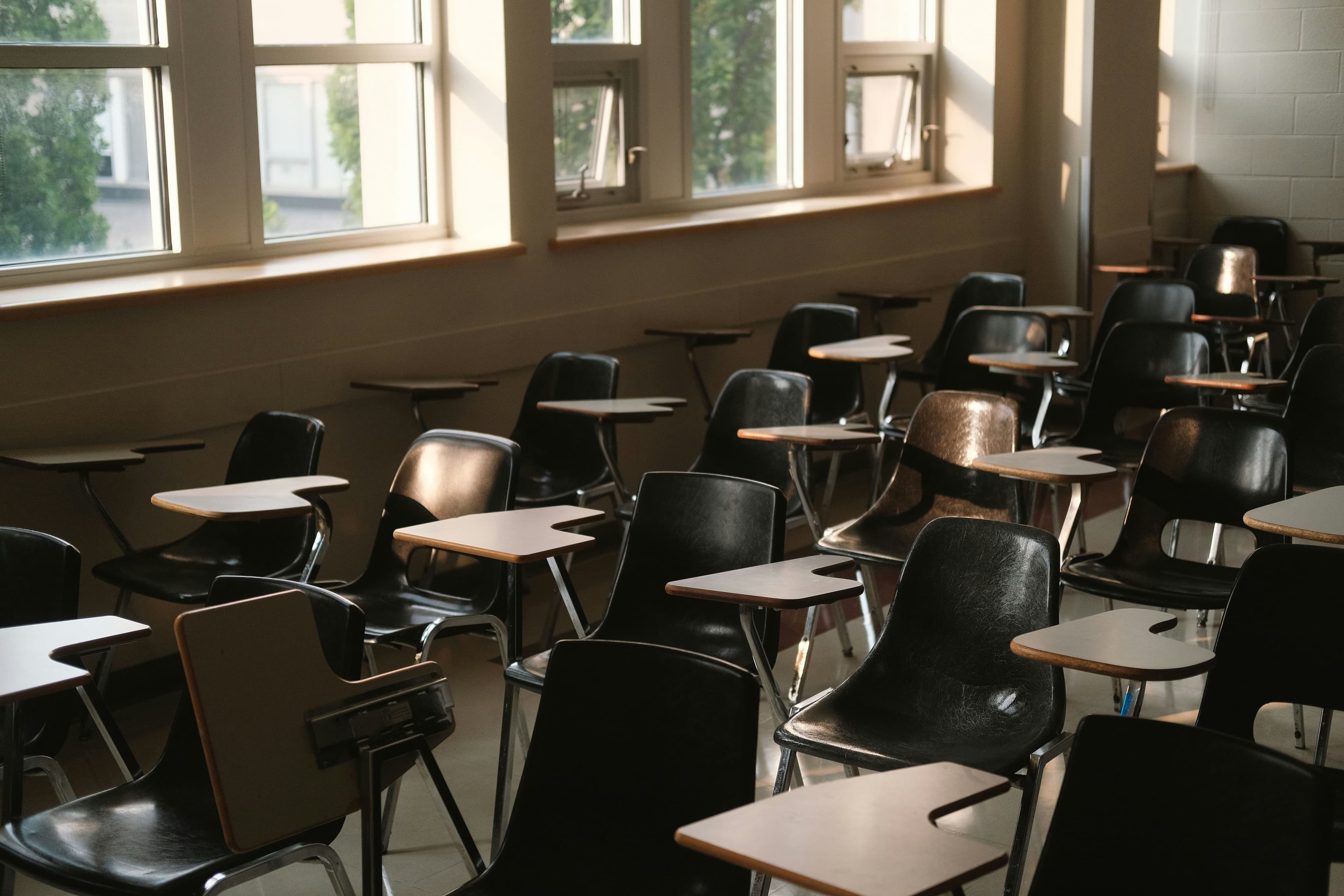 Empty classroom lit by morning light